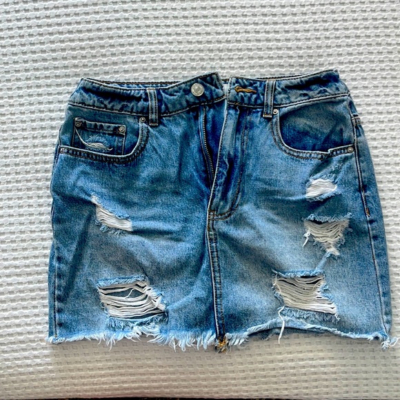 Cute Forever21 denim skirt with small rips